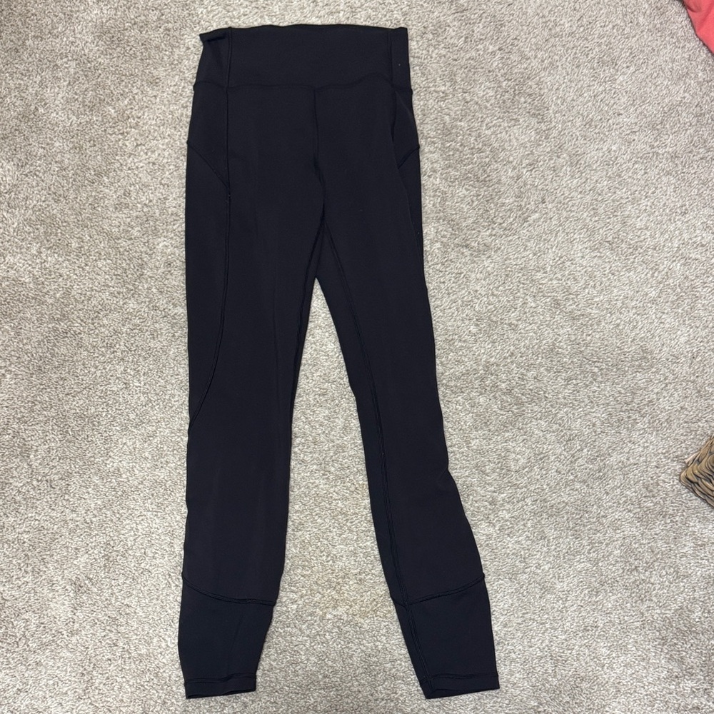 In movement lululemon leggings size 4